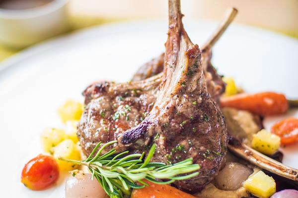 lamb meat and vegetables on a plate